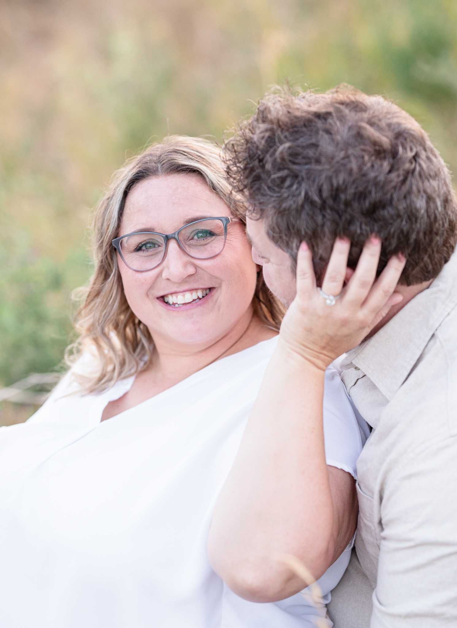 Intimate outdoor portrait with soft natural lighting.