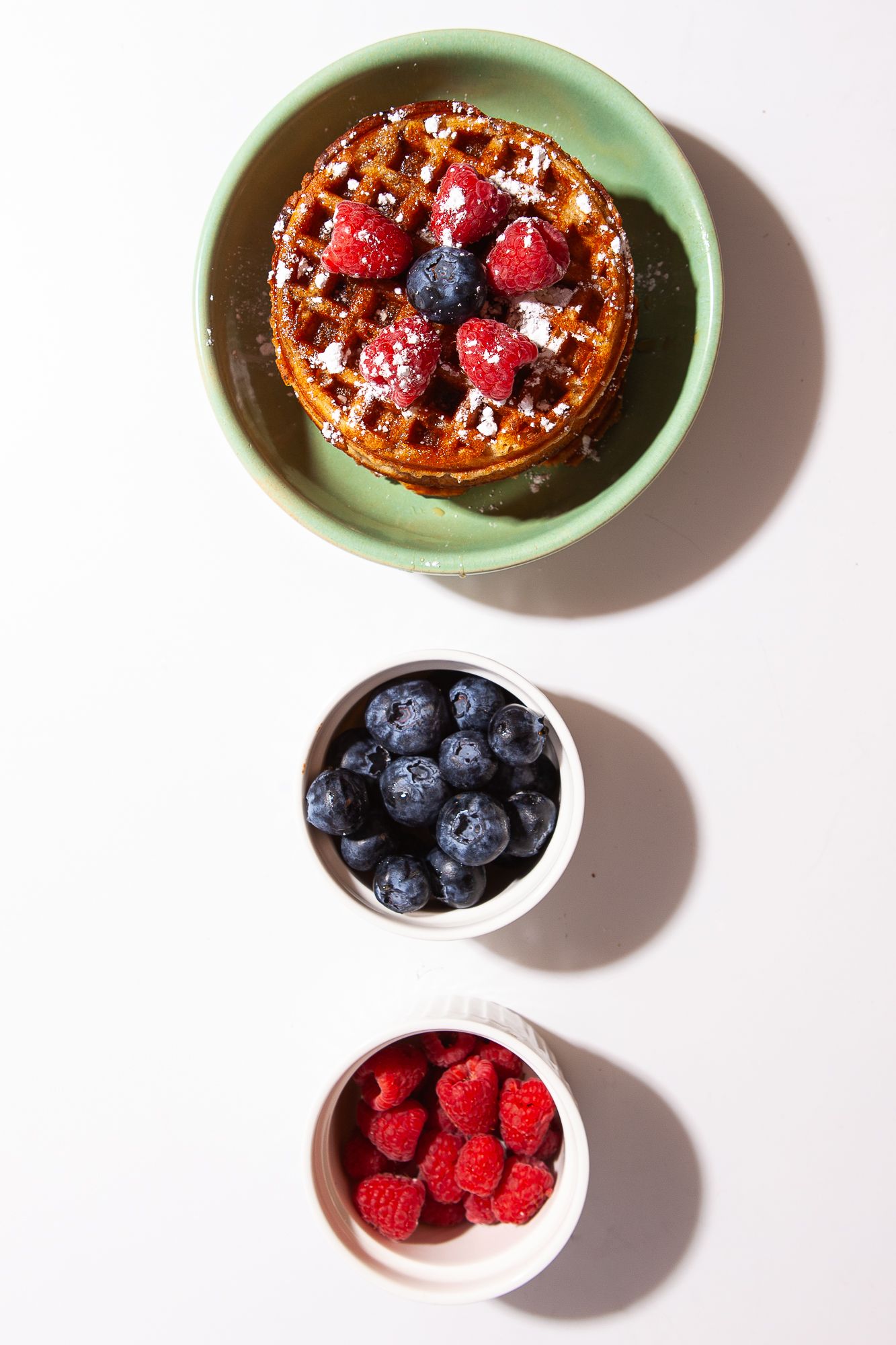 Studio photo of waffle and fruit