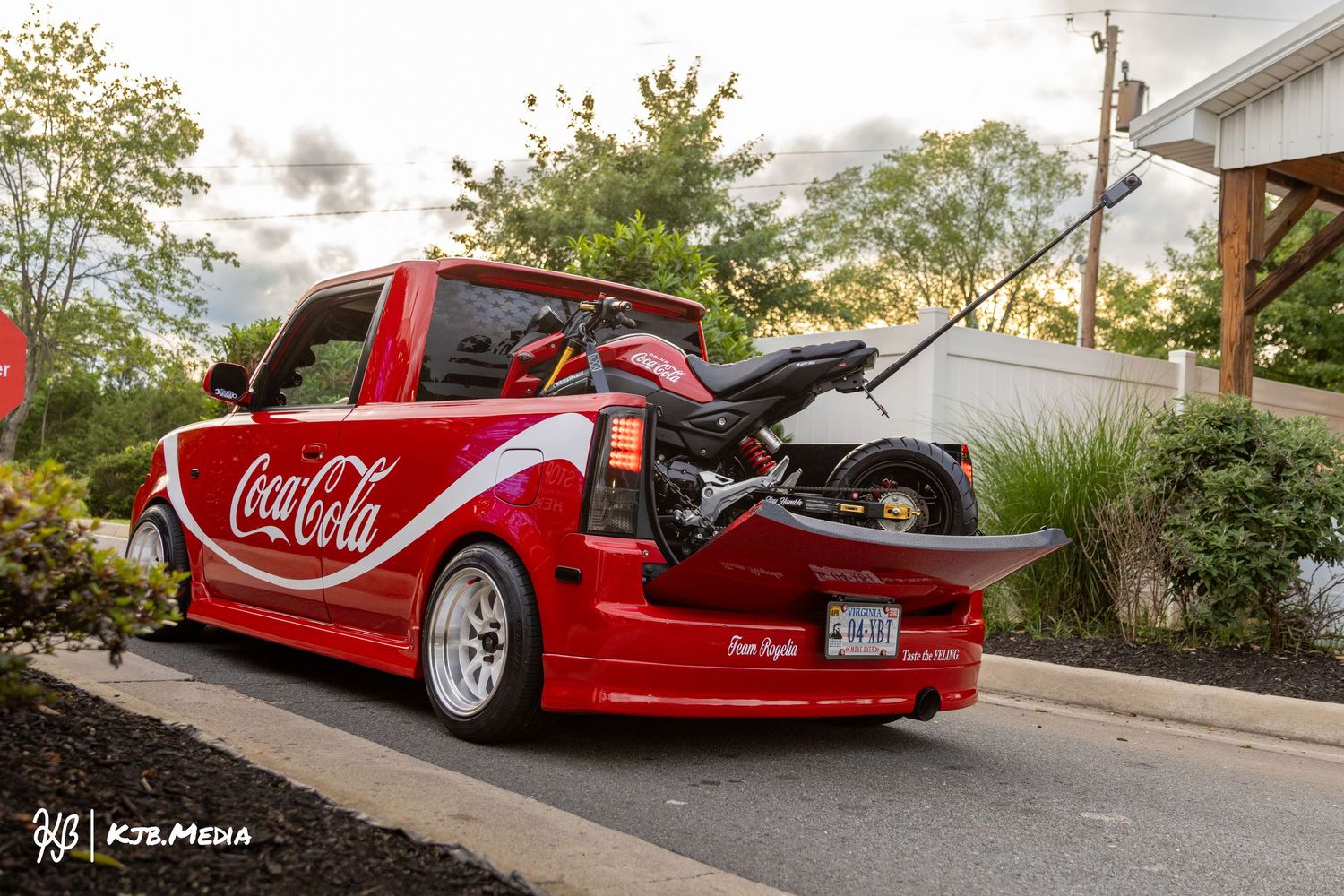 Lowered red Coca-Cola themed custom truck shot from multiple angles at sunset.