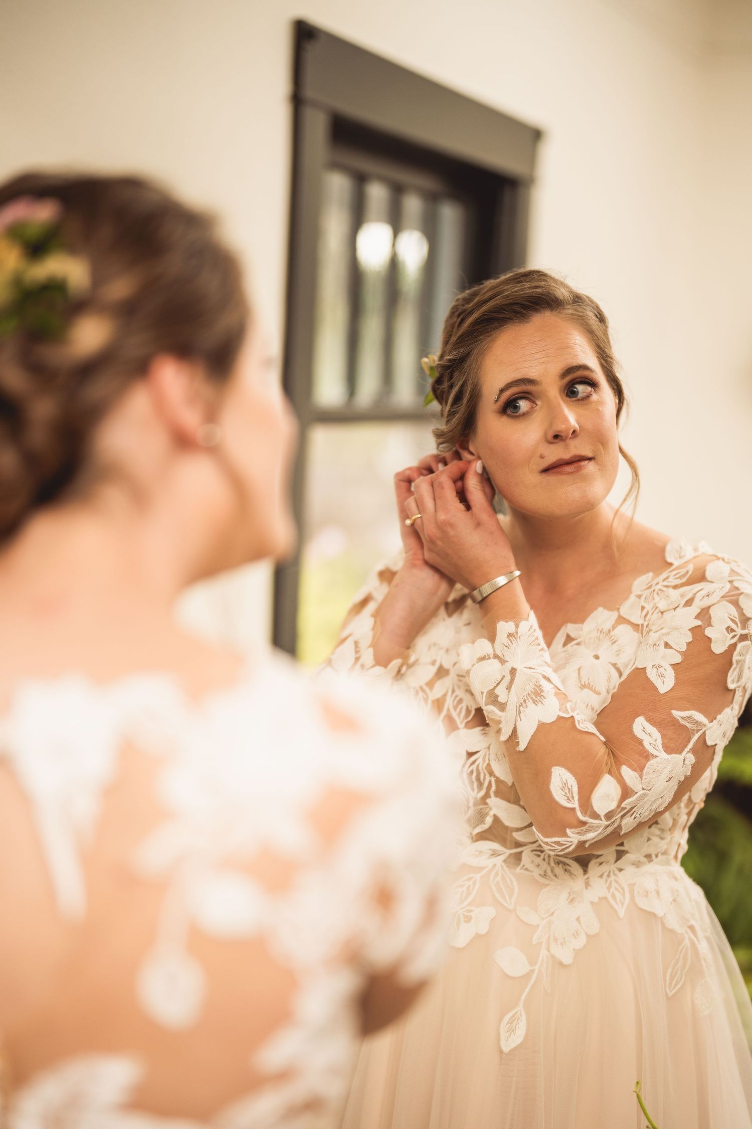 Elegant wedding preparation scene with classic bridal jewelry and accessories.