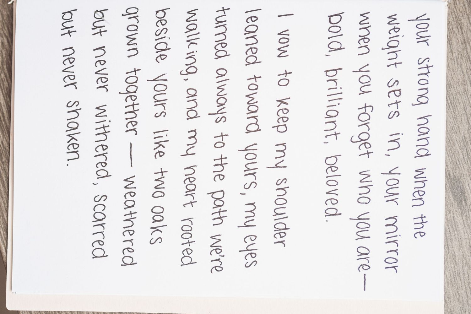 Closeup of handwritten text on paper showing detailed personal notes.