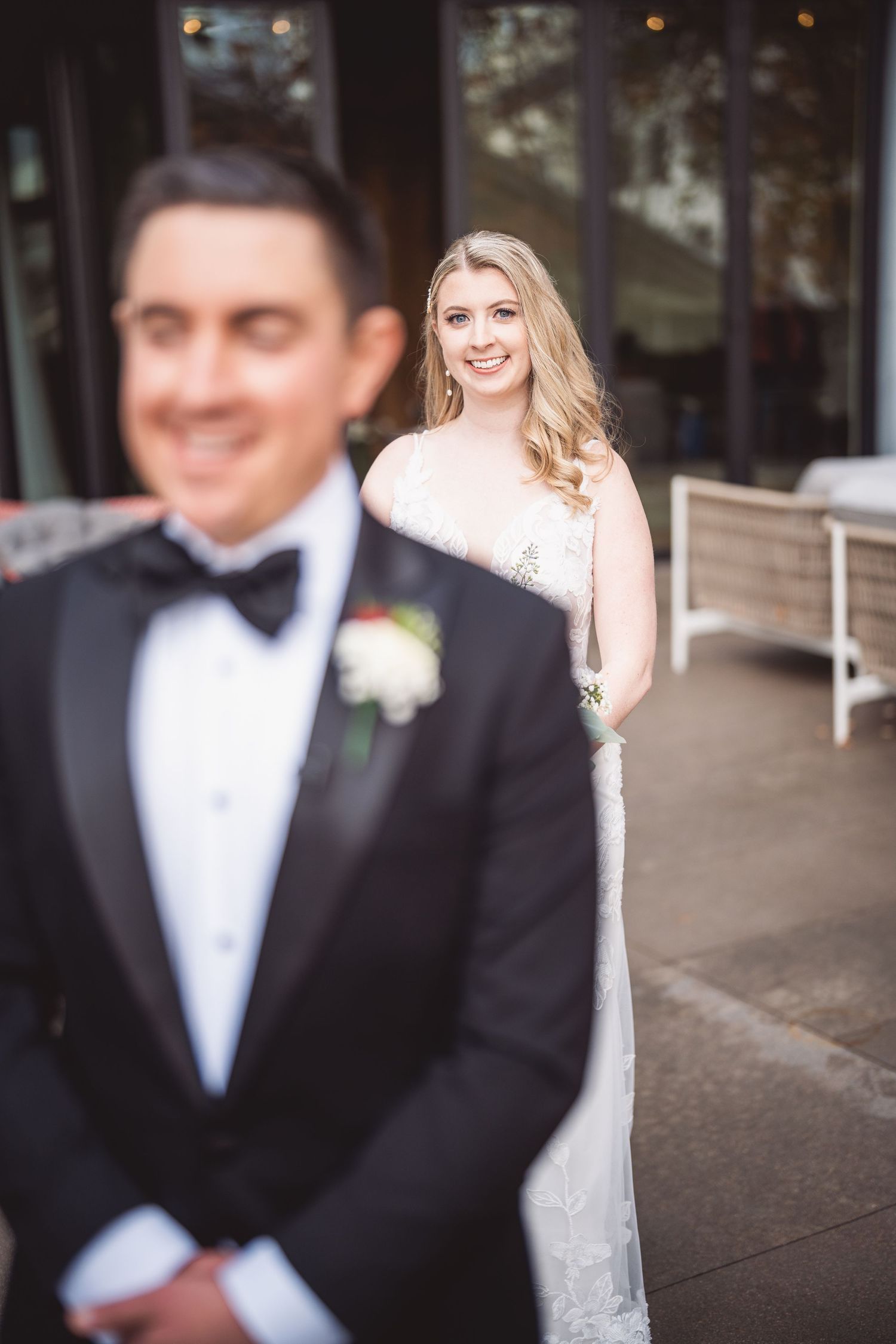 Artistic wedding portraits showing couple in tuxedo and white dress.
