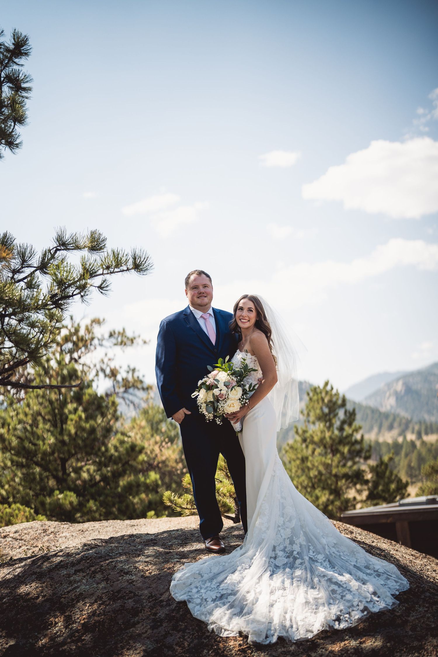 Wedding photography sequence showing couple and flowing dress train against mountain scenery.