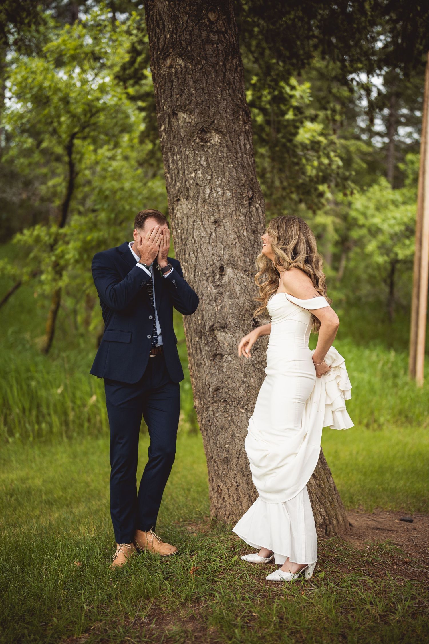 Playful wedding photo sequence around a tree in a green outdoor setting.