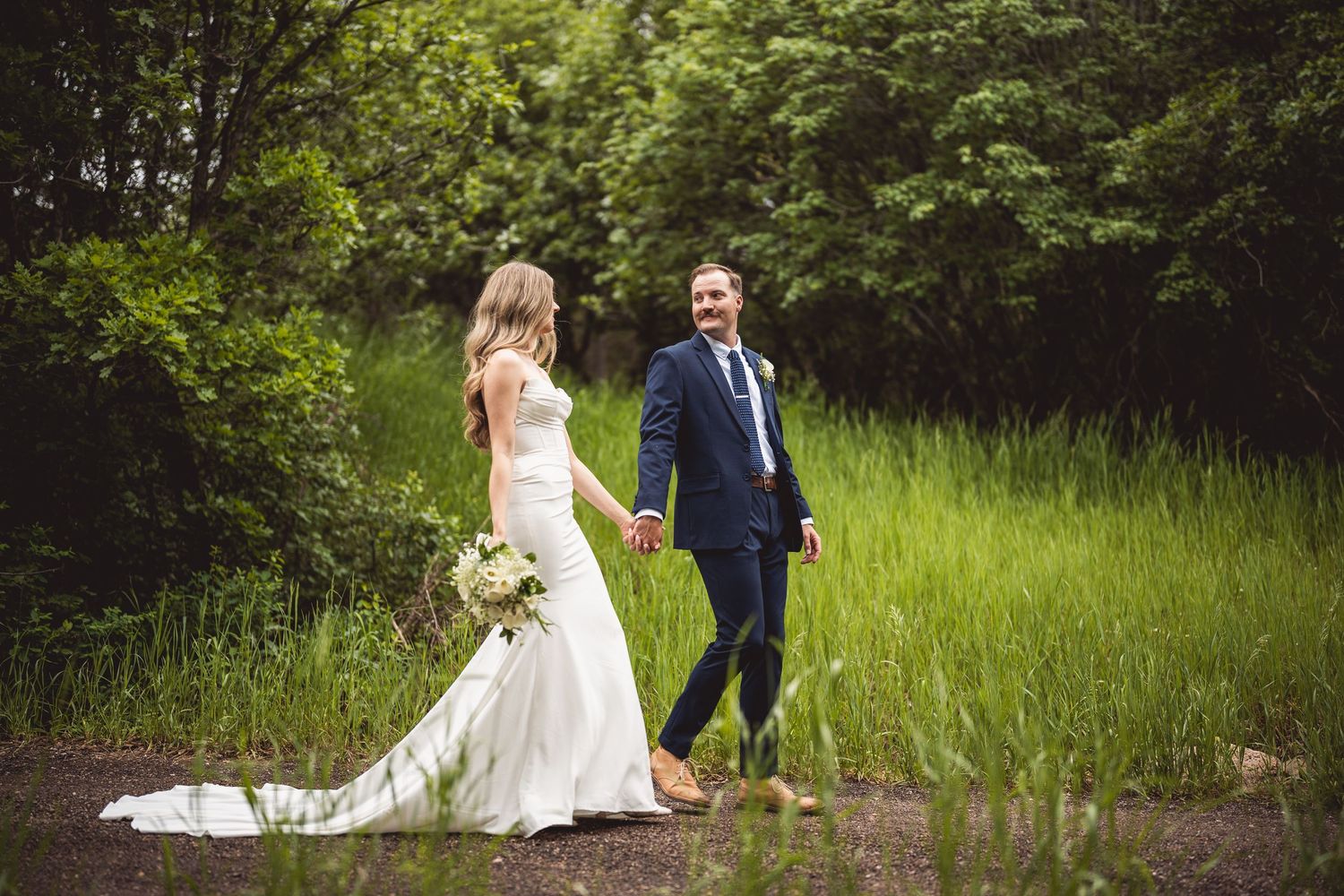 Wedding photography sequence showing couple walking and embracing in outdoor garden setting.