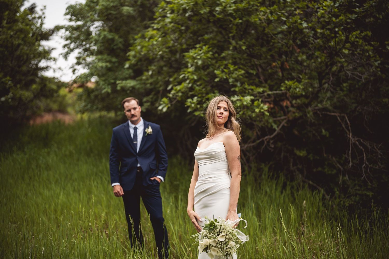 Wedding photo sequence in a natural setting with tall grass and trees.