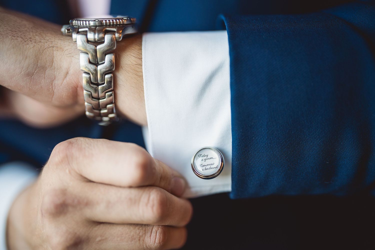 Series of detailed shots showing hands adjusting silver cufflinks on a formal white shirt.