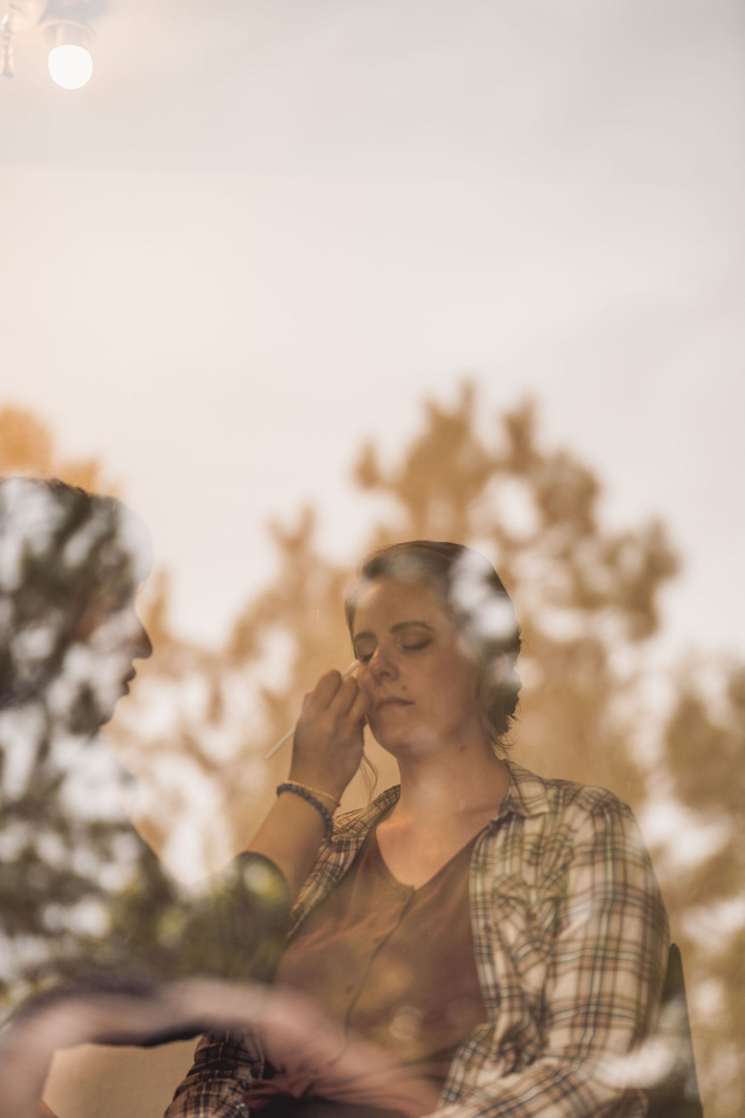 Dreamy golden hour portrait session with soft sunlit bokeh effects.