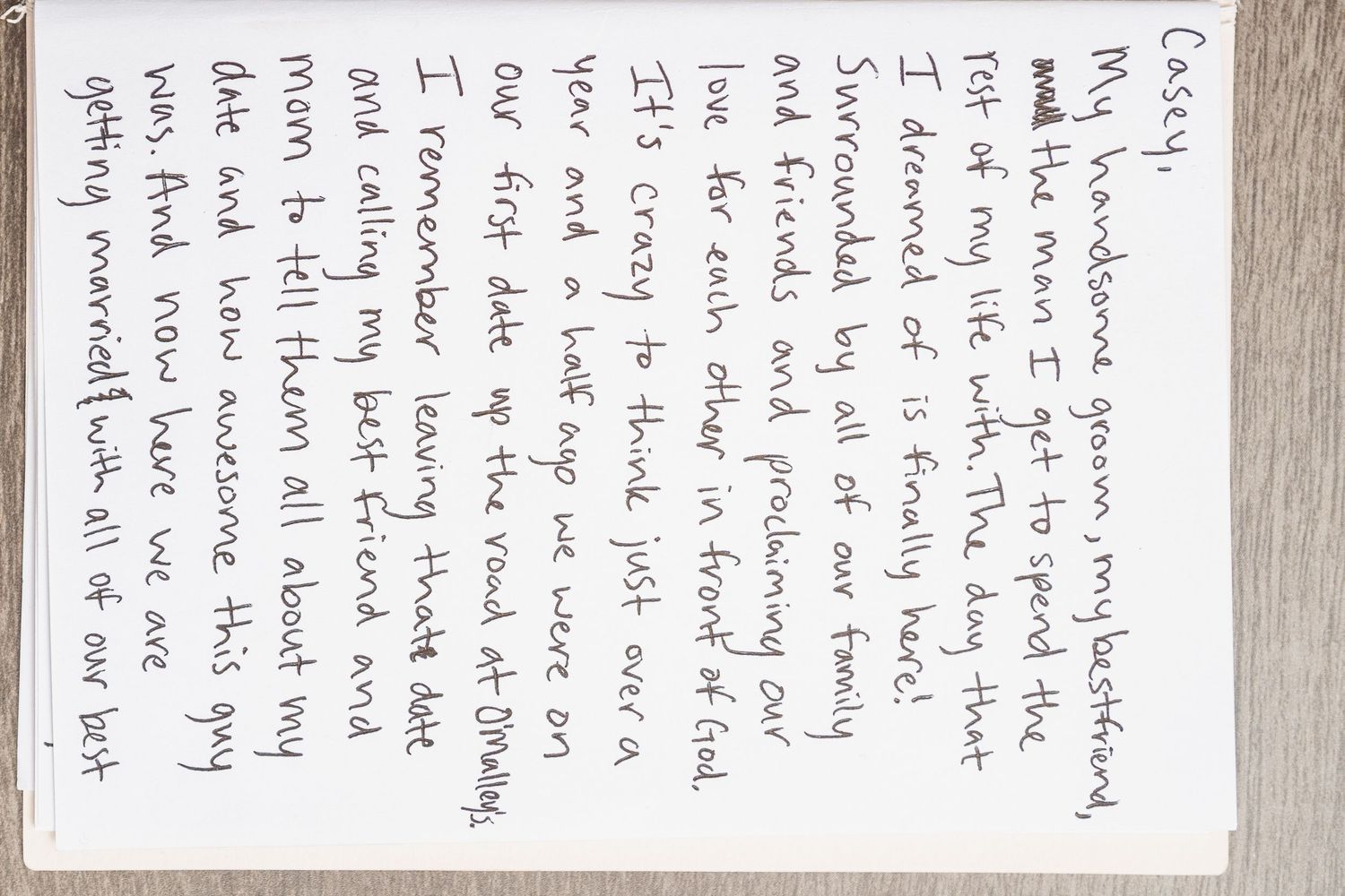 Multiple pages of handwritten text on white paper with cursive writing.