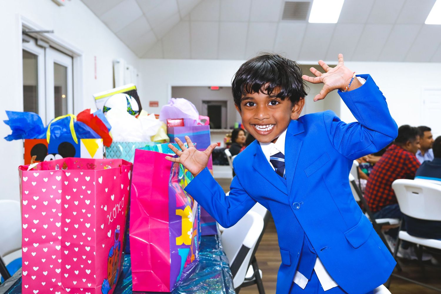 Birthday boy with gifts
