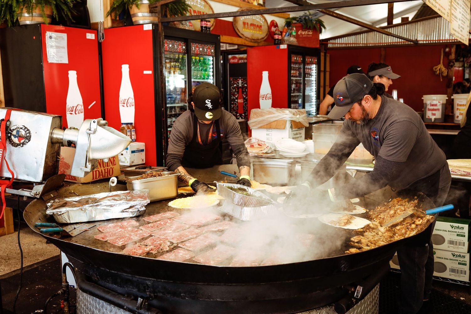 Two men cooking