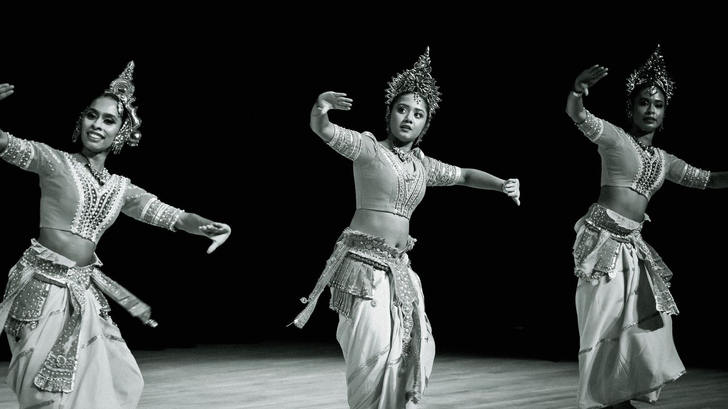 Three traditional dancers.
