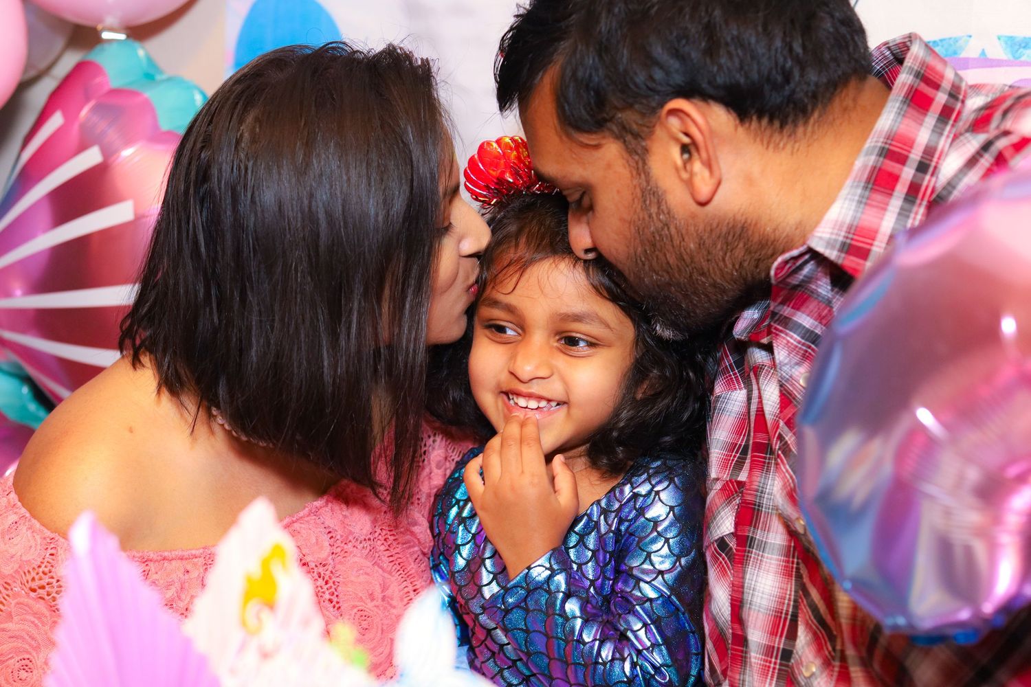 Mom, dad, and the birthday girl