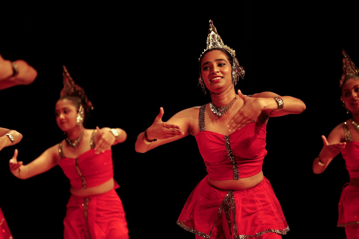 traditional dancers. red costumes.