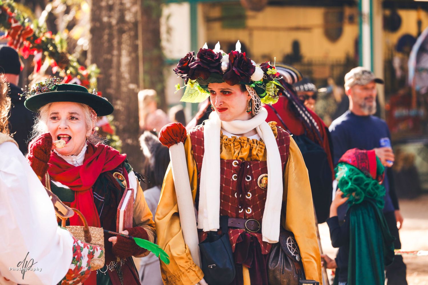 People wearing renaissance style costumes.