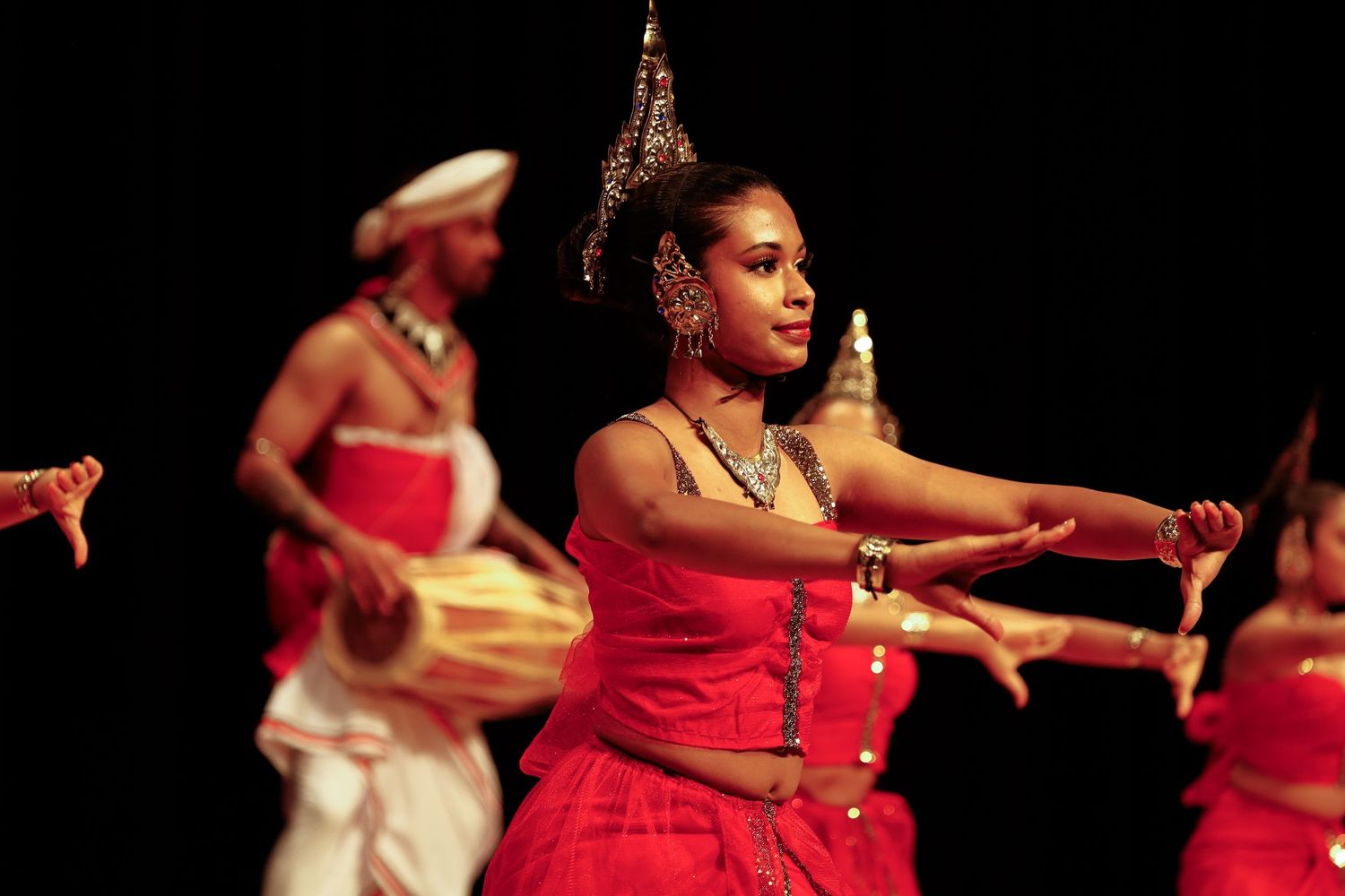 traditional dancers. red costumes.