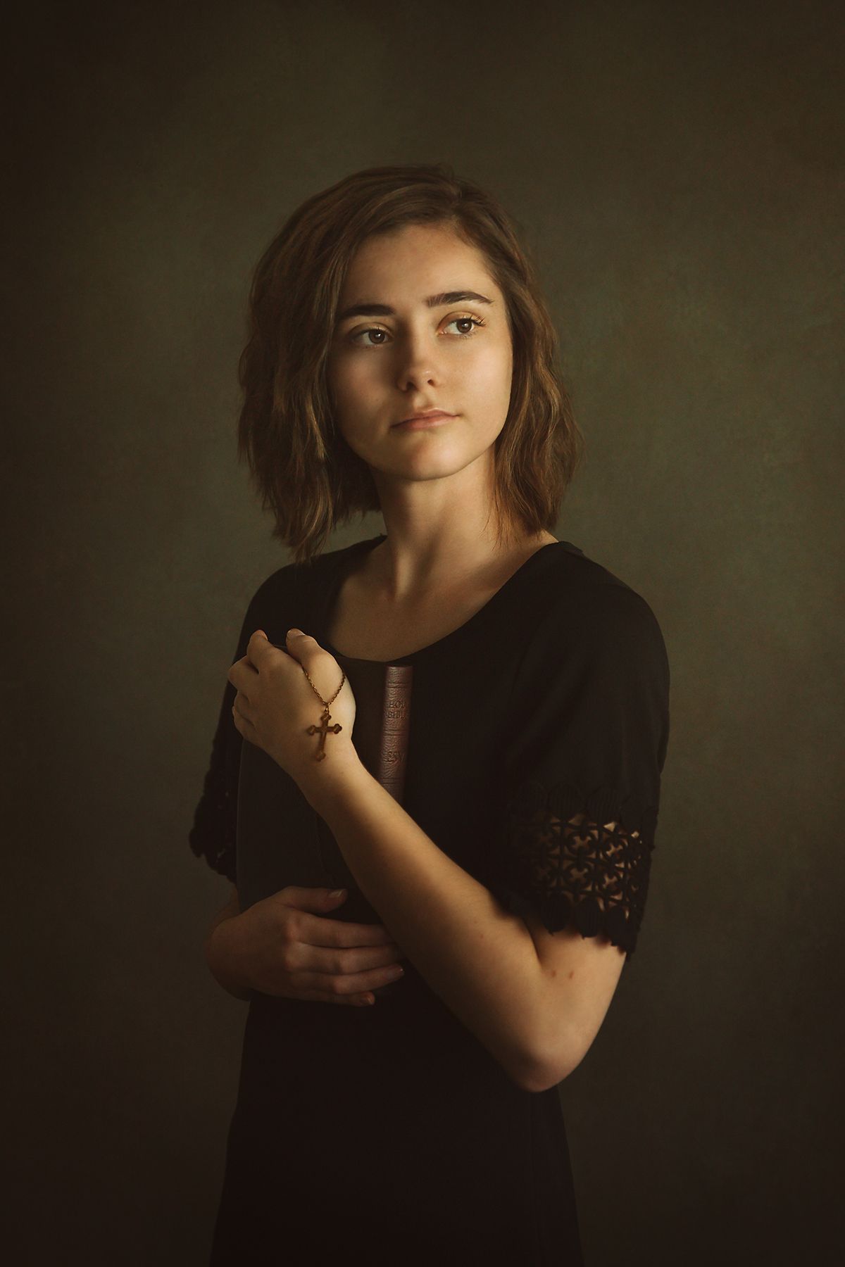 Moody portrait series showing expressive poses against dark background.