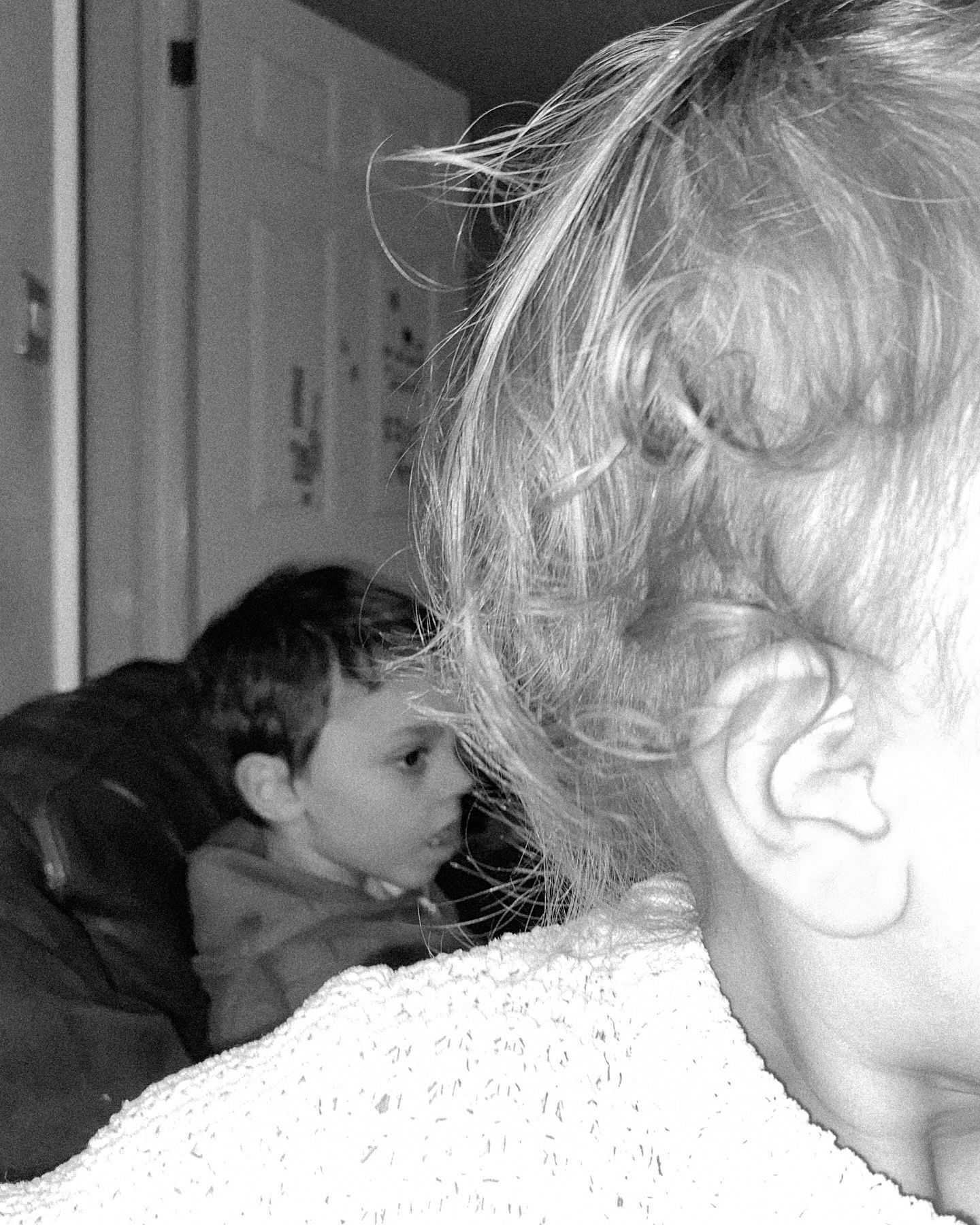 Close-up profile views in soft focus creating an abstract pattern.