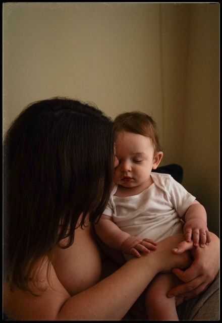 Intimate indoor photo sequence showing a tender maternal bonding moment in warm ambient lighting.