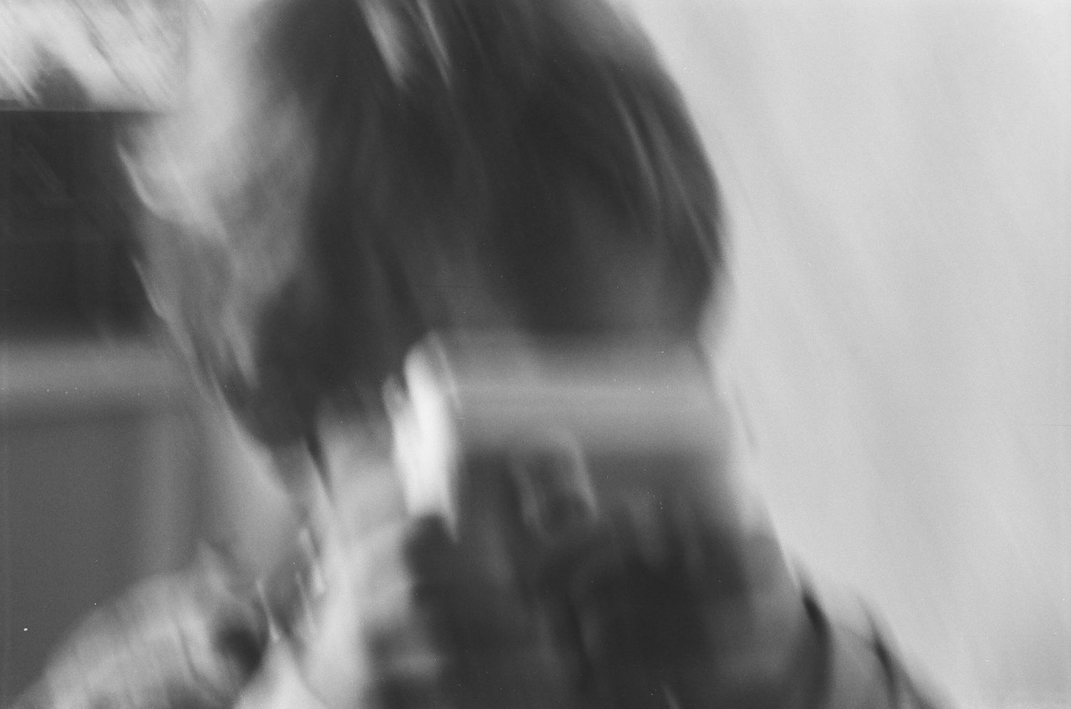 Abstract blurred black and white photograph creating a motion effect.