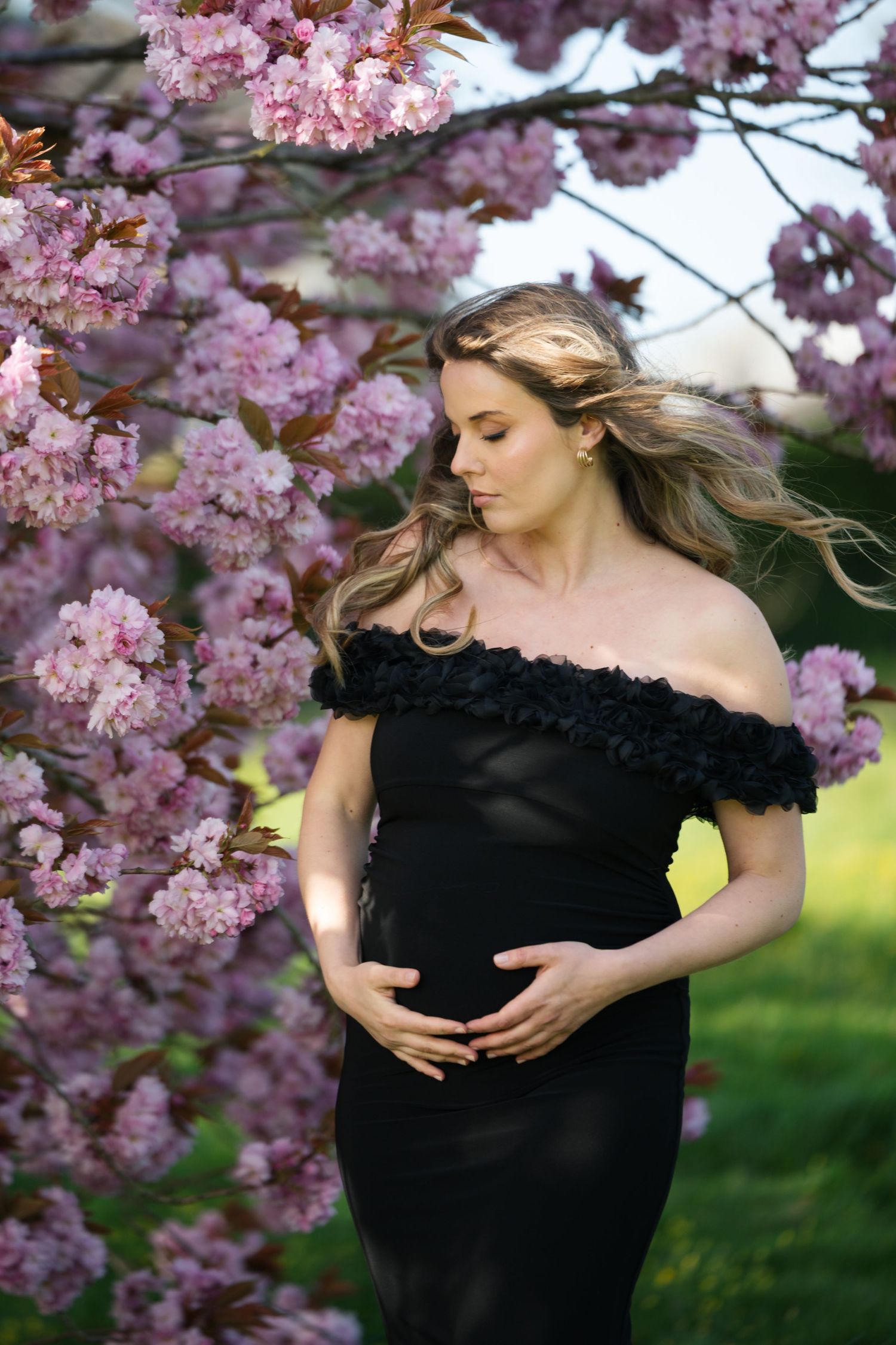 Outdoor maternity photoshoot in Lancashire with natural light and relaxed posing