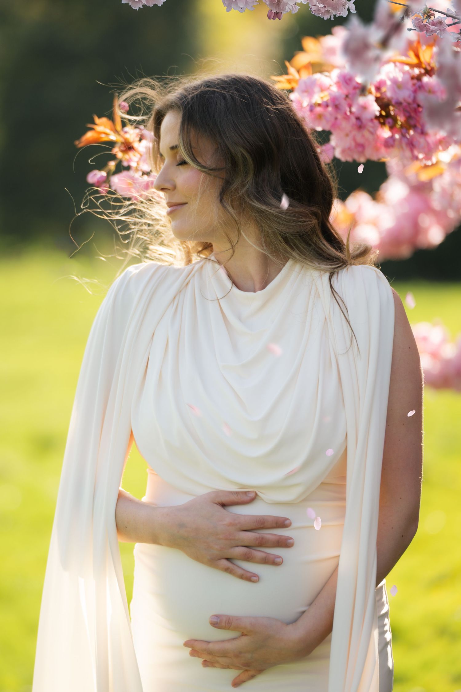 Outdoor maternity photoshoot in Lancashire with natural light and relaxed posing