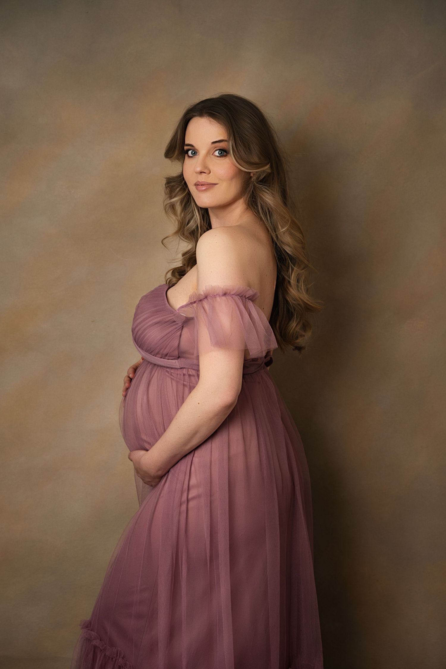 Studio maternity photography session in Clitheroe with soft neutral tones