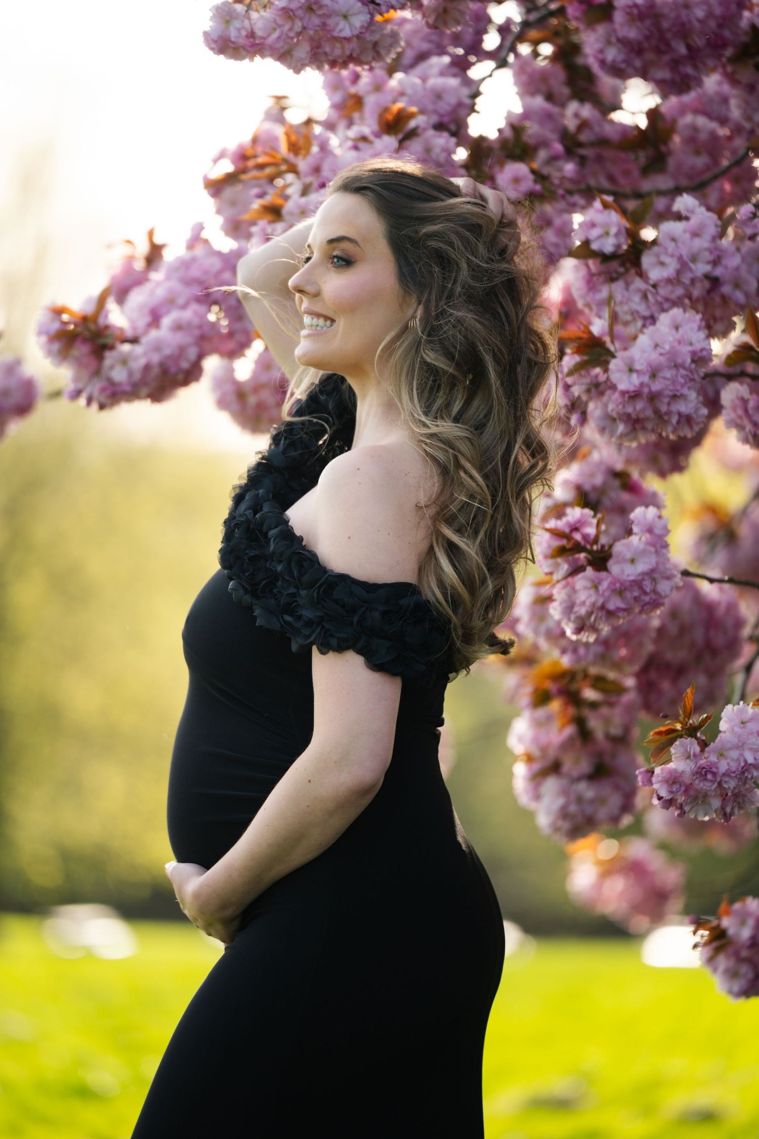 Outdoor maternity photoshoot in Lancashire with natural light and relaxed posing