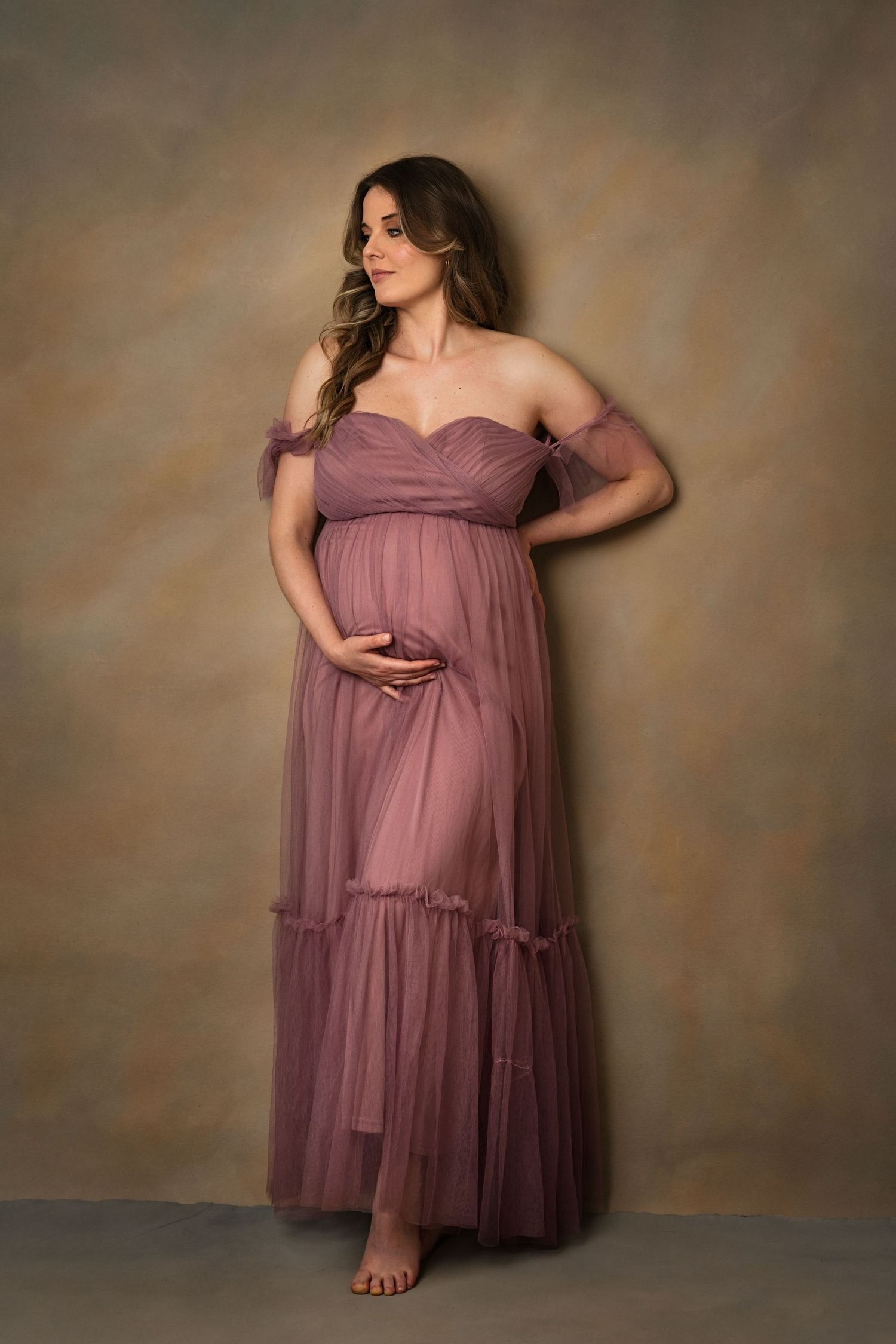 Studio maternity photography session in Clitheroe with soft neutral tones