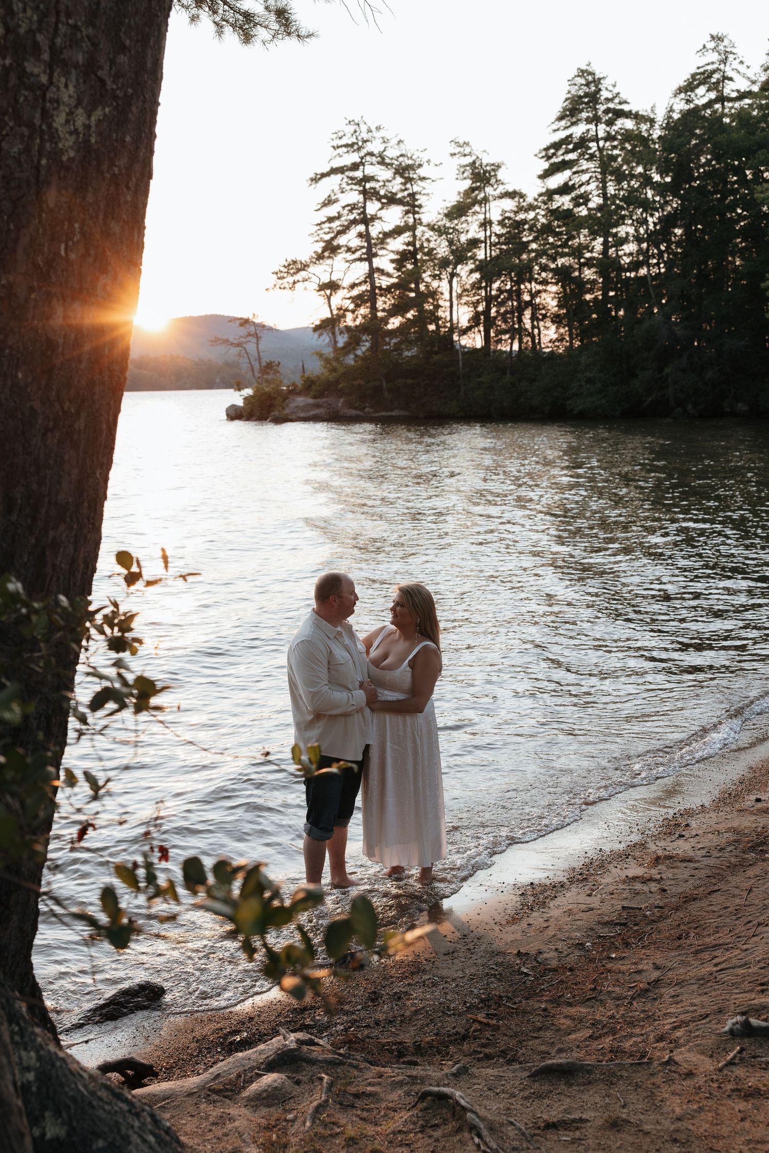 Couple engagement photos on Lake Winnipesaukee.