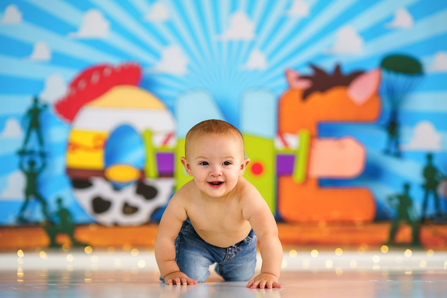 Colorful pirate-themed backdrop with sunburst pattern and palm tree silhouettes.