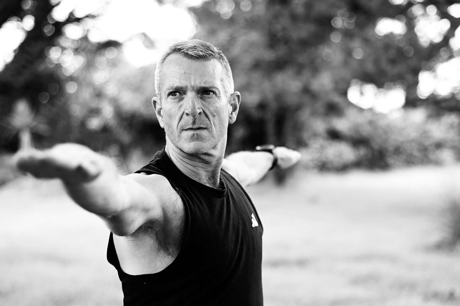 Black and white outdoor portrait series showing different emotional expressions.
