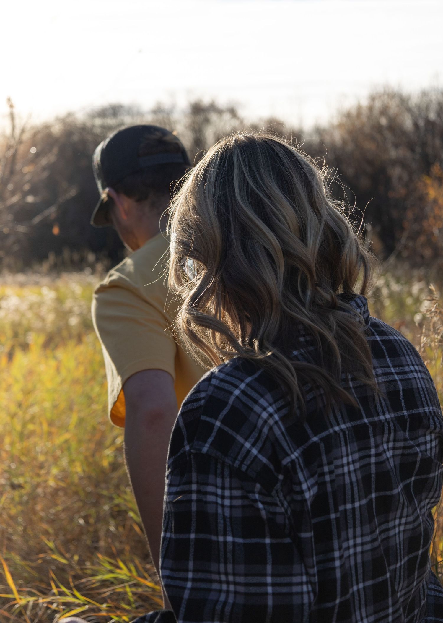 couple photoshoot in grass field