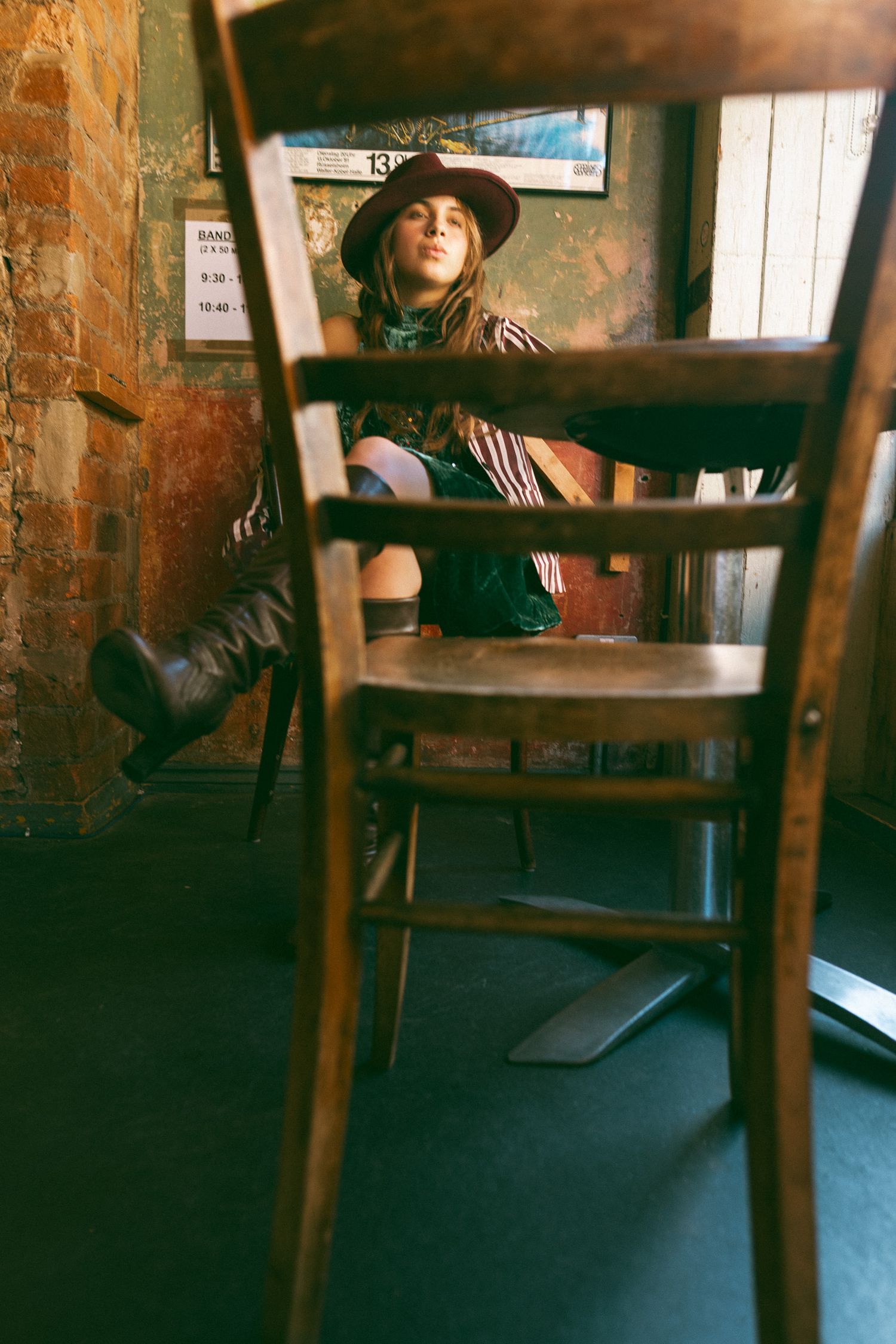 Woman photographed through a chair
