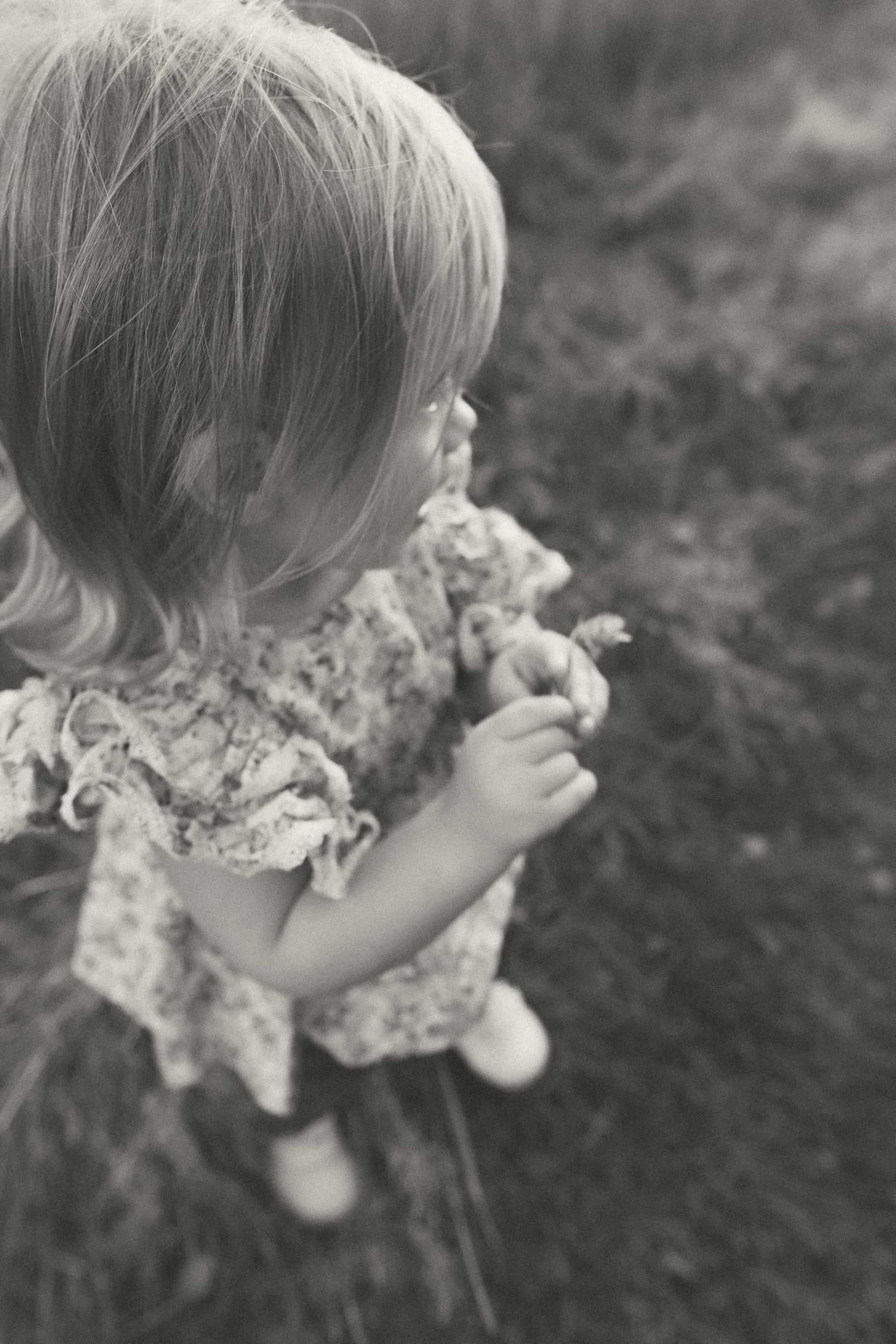 Black and white portrait of child from above