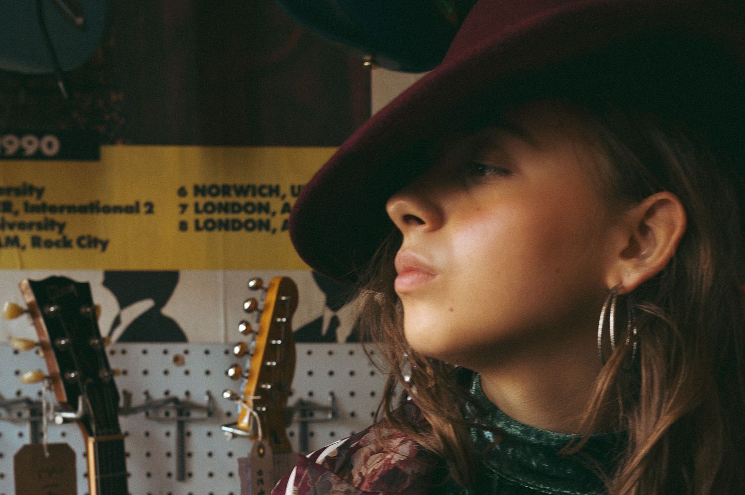 Close up profile of woman in Fedora