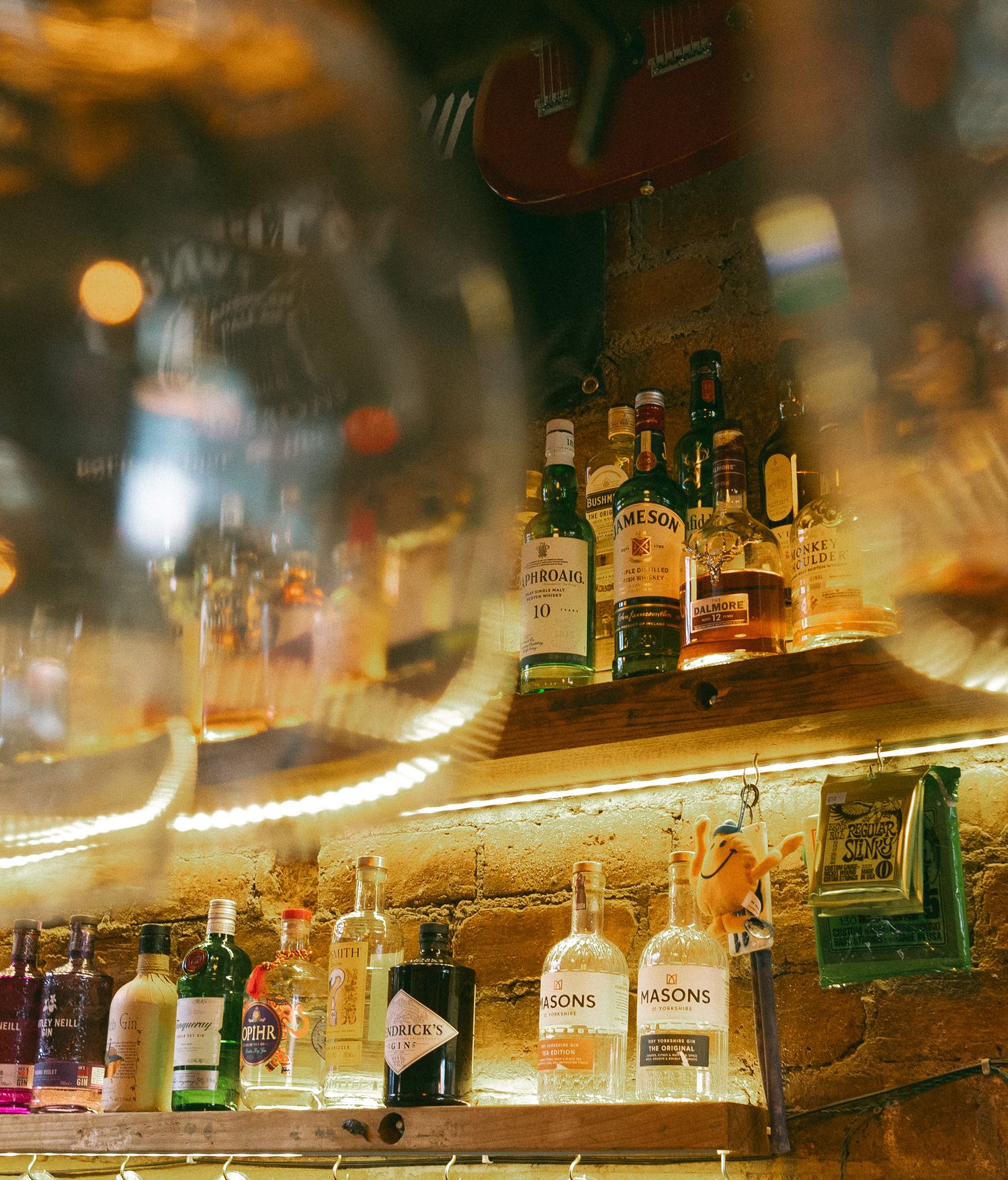 Drinking spirits shot through wine glasses