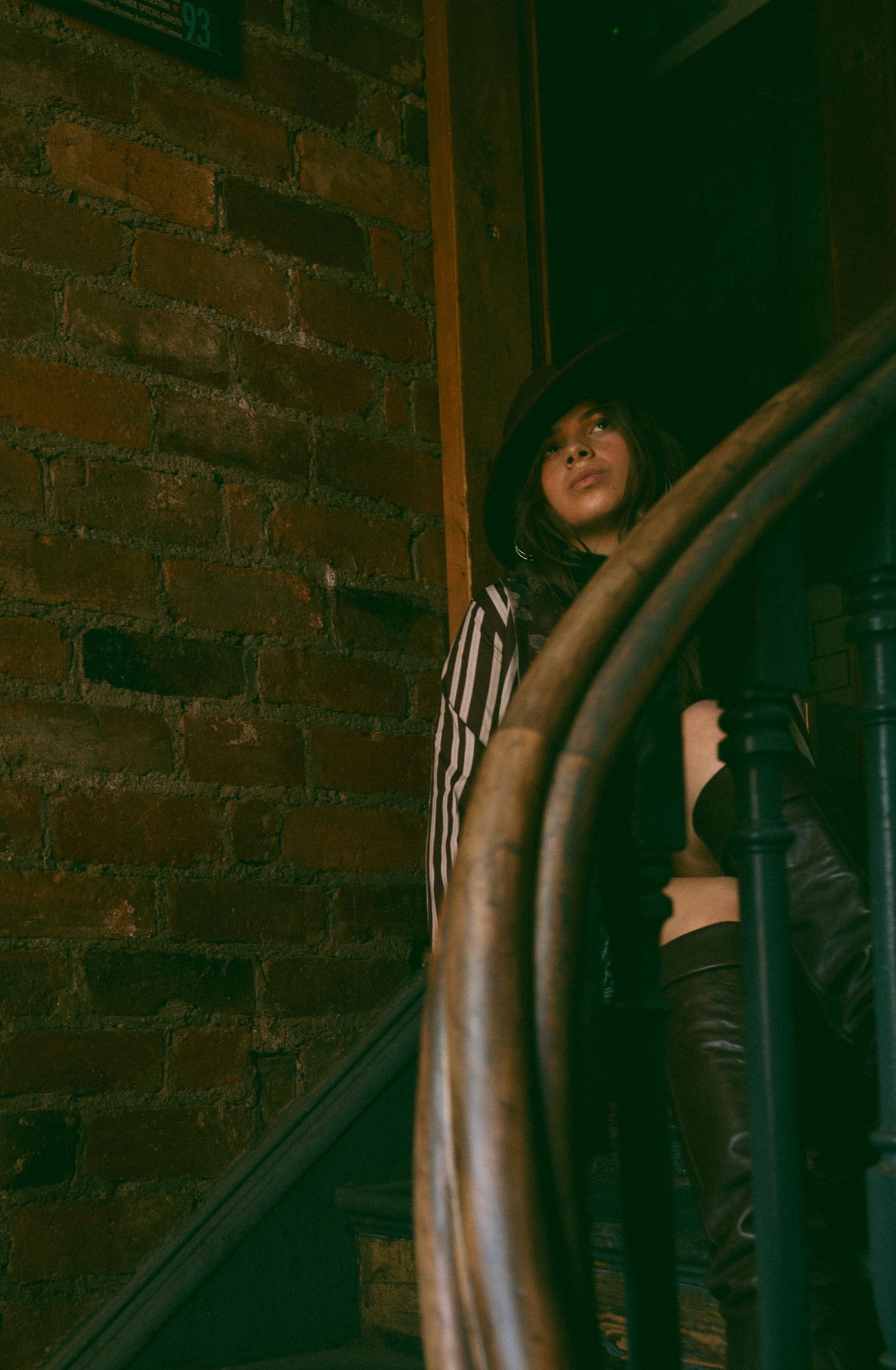 Woman sat on stairs