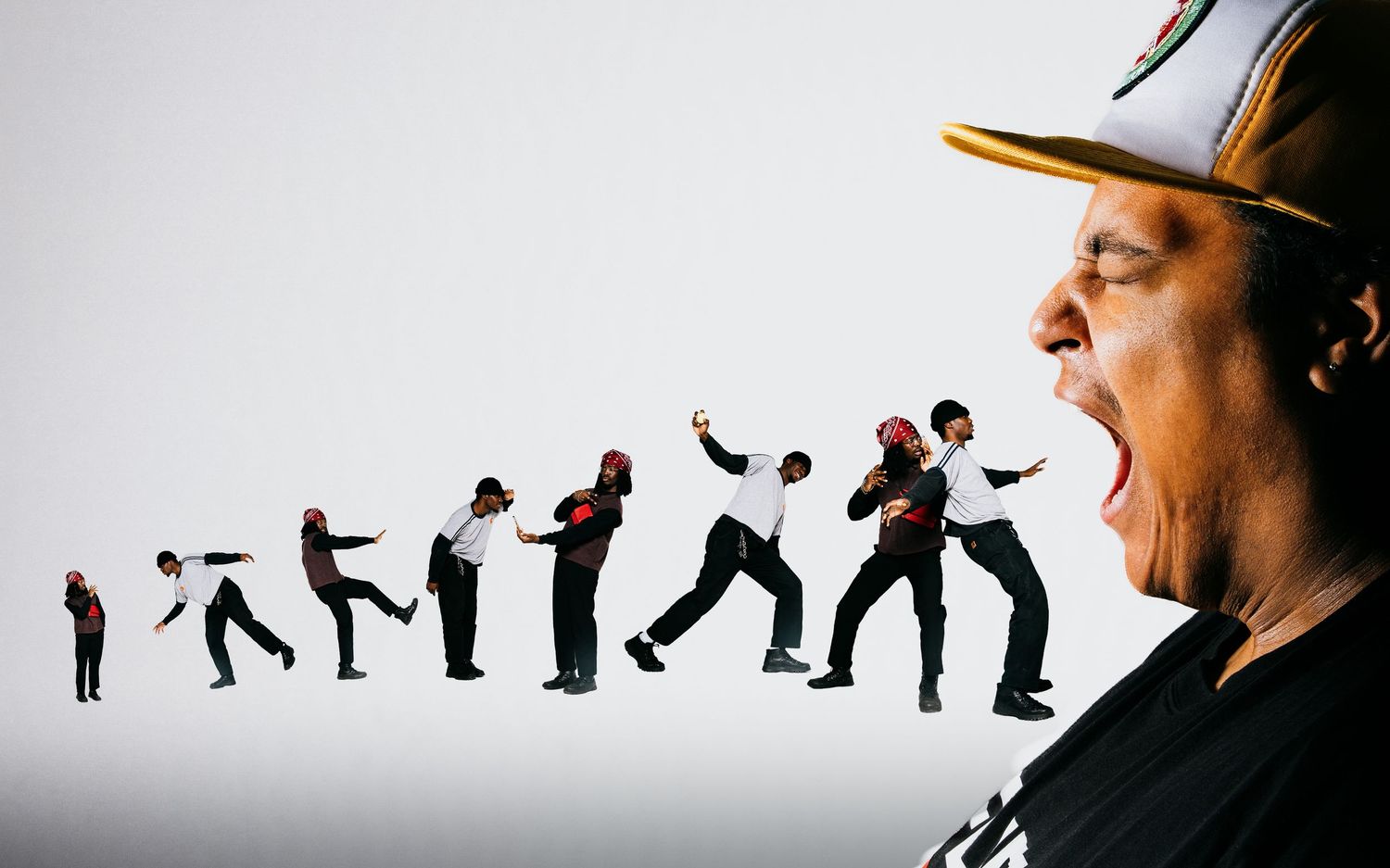 Dynamic composite photo of dancers in motion with person shouting in foreground.