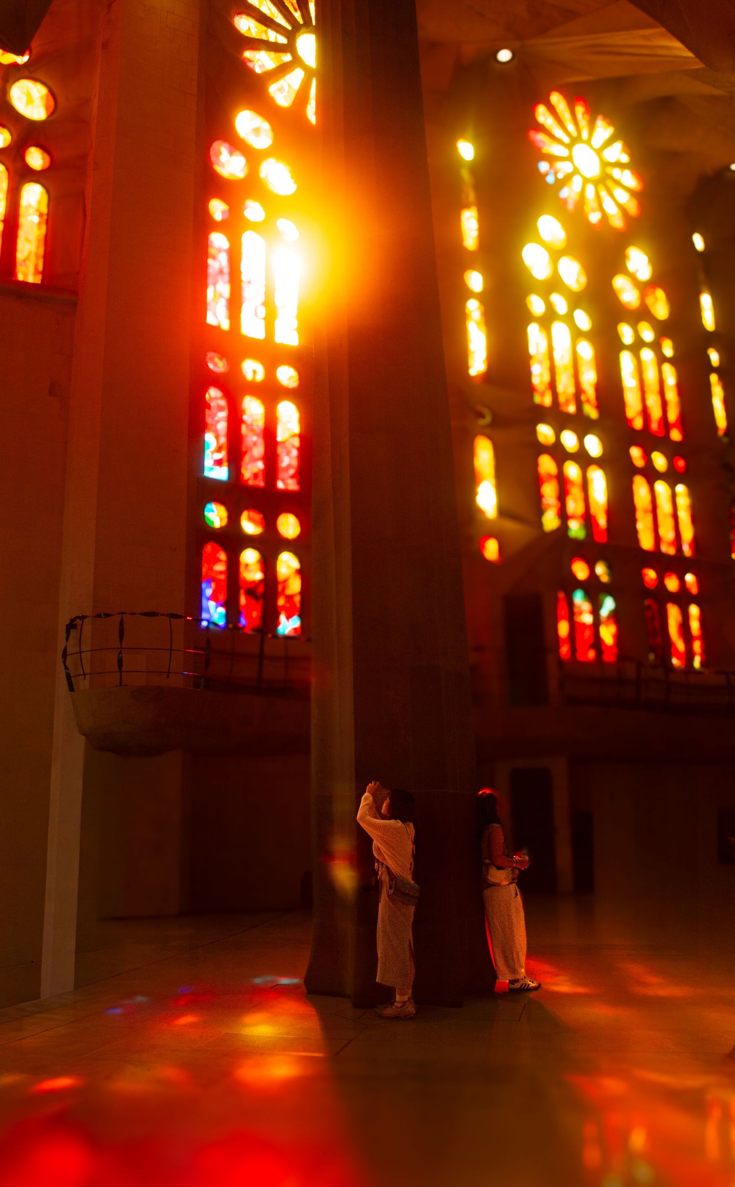 Image of two young women in a church by Raechel Chapman Photography