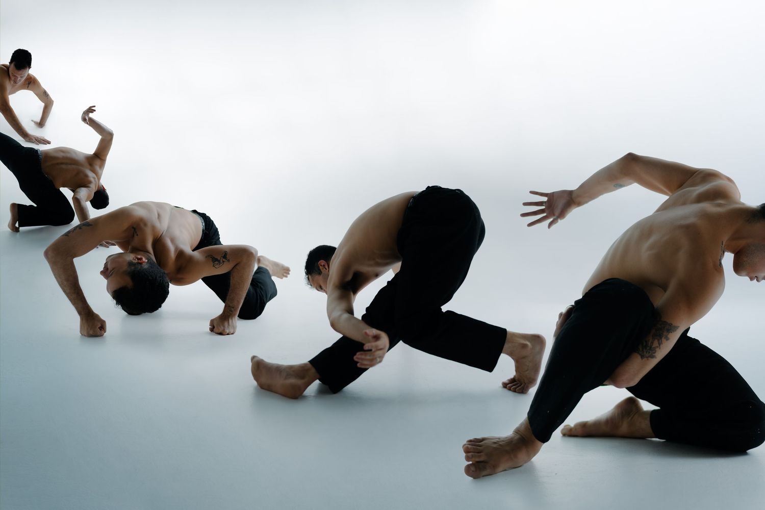 Contemporary dancers perform graceful movements in a sequence showing fluid motion and artistic expression.