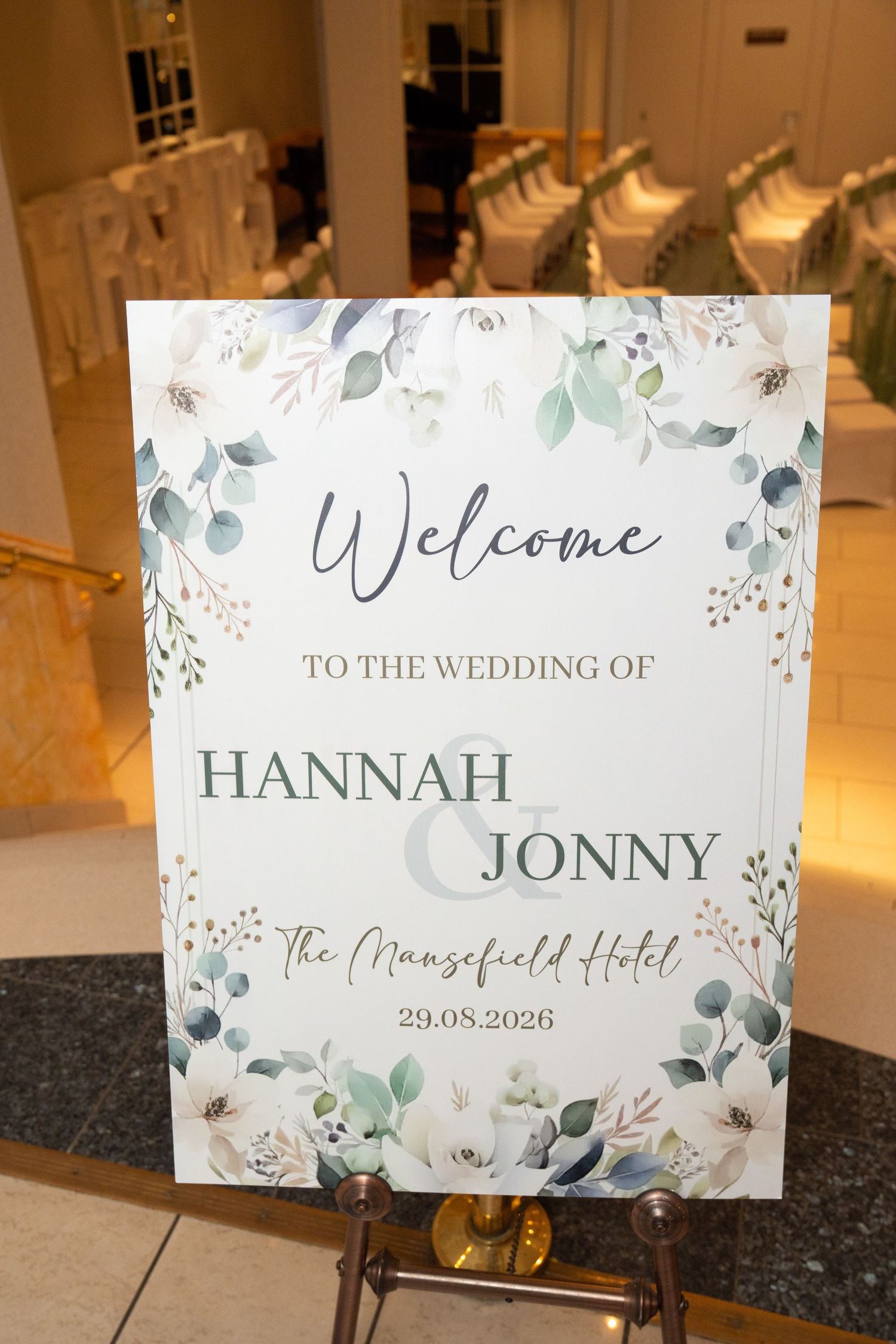 Elegant wedding welcome sign for Hannah and Jonny at The Mansefield Hotel on 29.08.2026 with floral decoration.