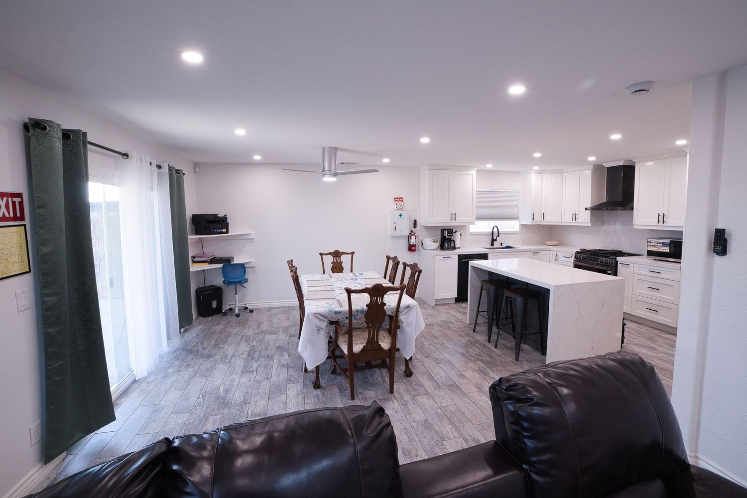 open plan, communal kitchen dining living room at 1st Care Facility, home based RCFE, residential care facility for elderly in Highland, CA