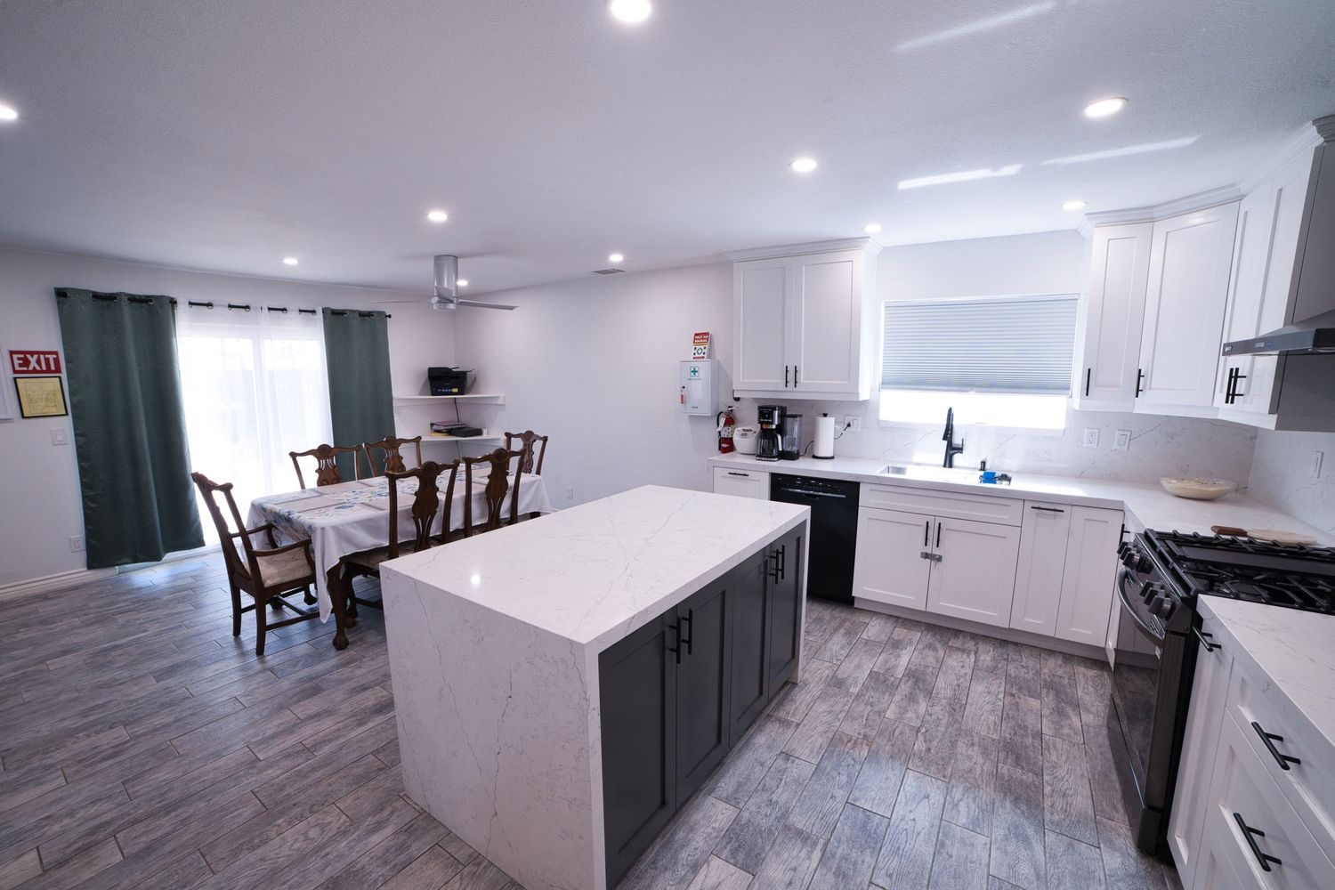 communal kitchen and dining area at 1st Care Facility, home based RCFE, residential care facility for elderly in Highland, CA