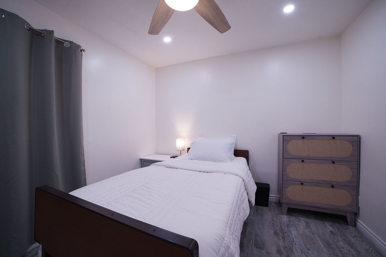 view of private bedroom 4 with personal TV at 1st Care Facility, home based RCFE, residential care facility for elderly in Highland, CA