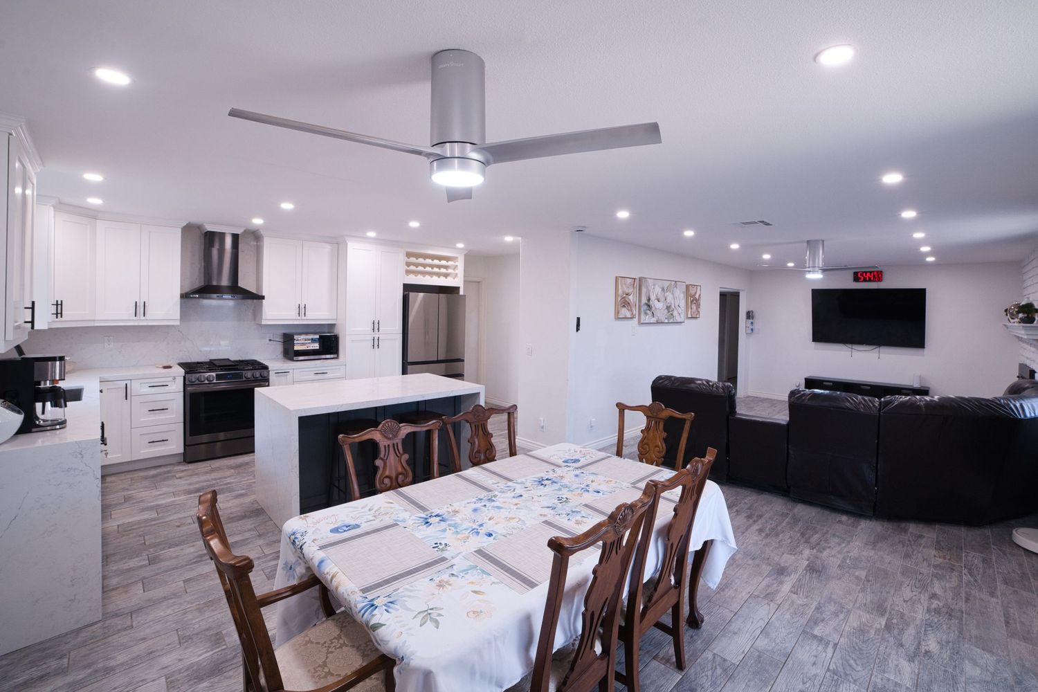 open plan, communal kitchen dining living room at 1st Care Facility, home based RCFE, residential care facility for elderly in Highland, CA