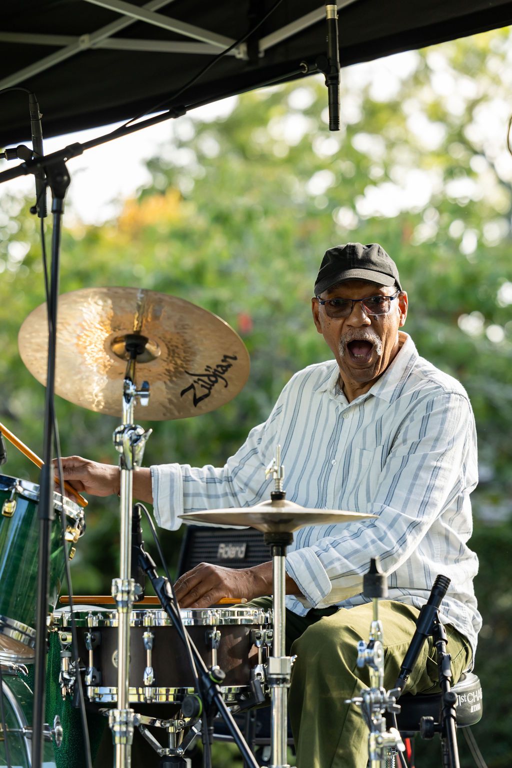 Claire House Photography event photograph of a jazz drummer at an outdoor event.