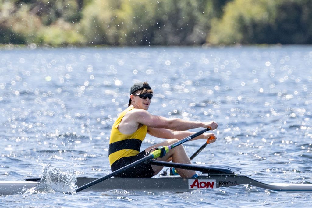 Claire House Photography sports event photograph of a single rower in a race.