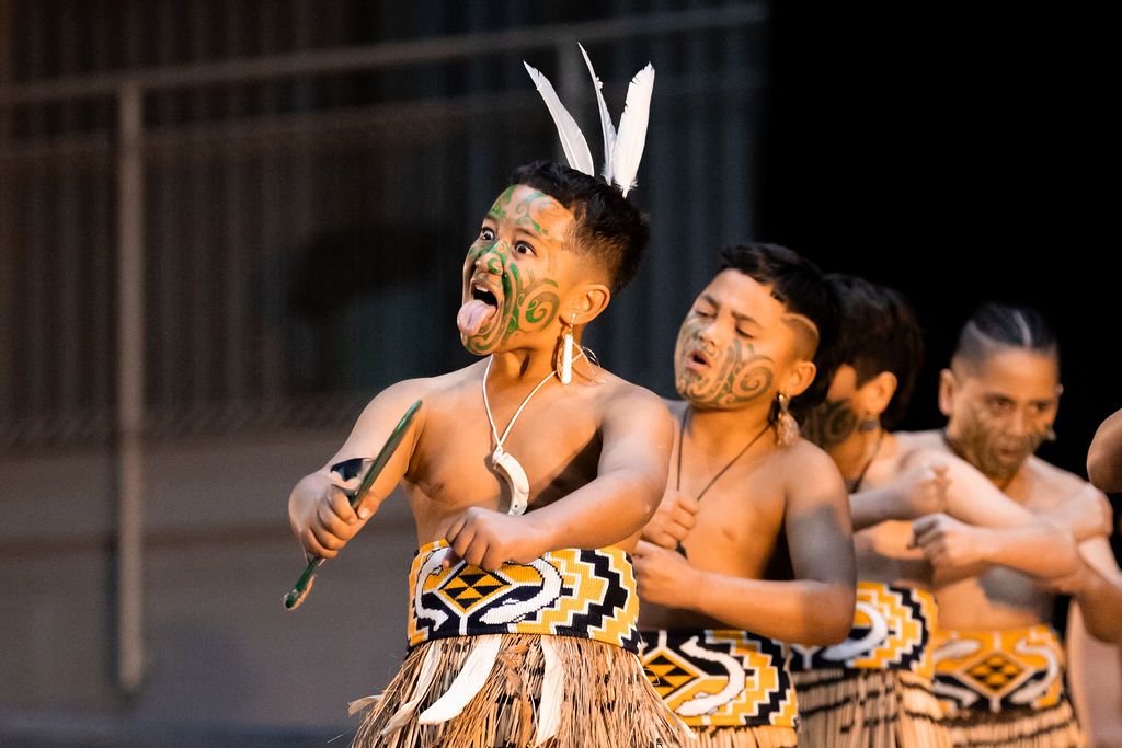 Claire House Photography community event photograph of a boy kaia leading a haka at the Rangitaiki Festival.