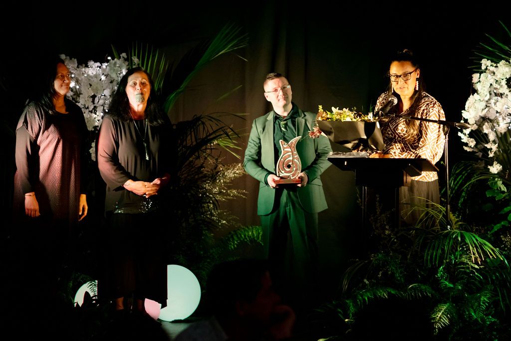 Claire House Photography event photograph of prize winner acceptance speech at HEG Business Awards.